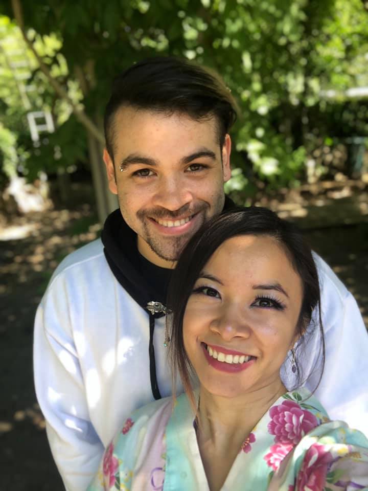 Chris and his partner in a park